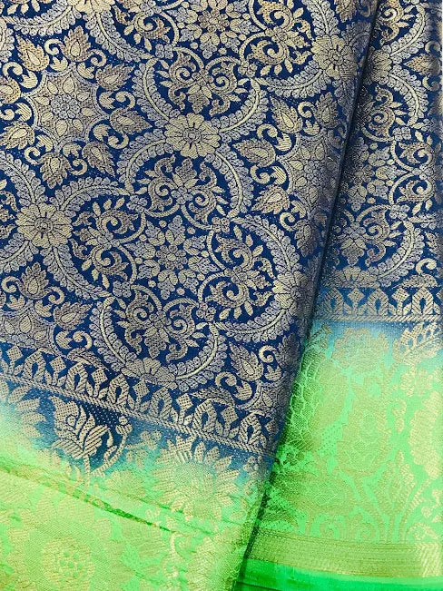 Charming Blue Color Banarasi Soft Silk Flower Motifs Saree With Brocade Blouse