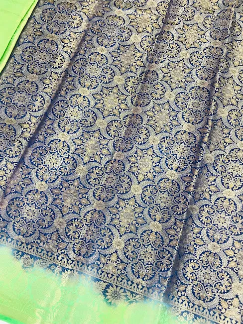 Charming Blue Color Banarasi Soft Silk Flower Motifs Saree With Brocade Blouse