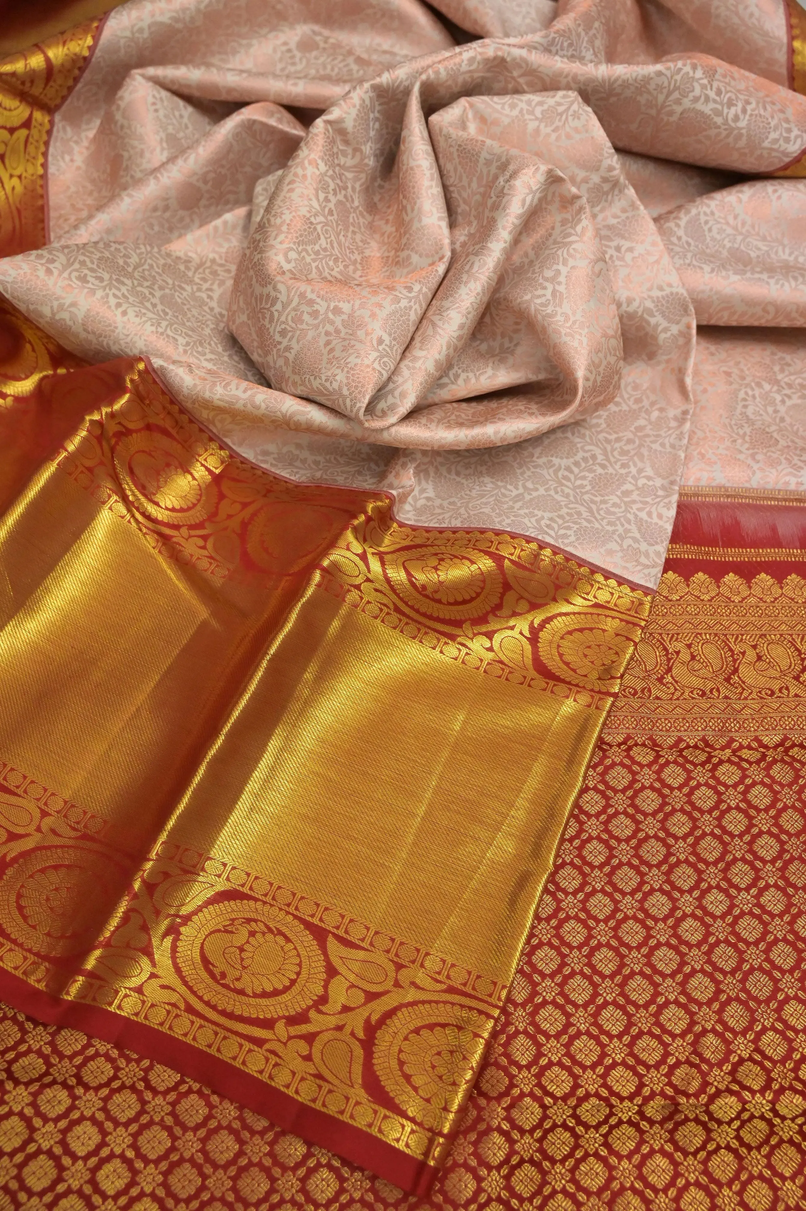 Salmon Offwhite Color Pure Brocade Kanjeevaram Silk Saree